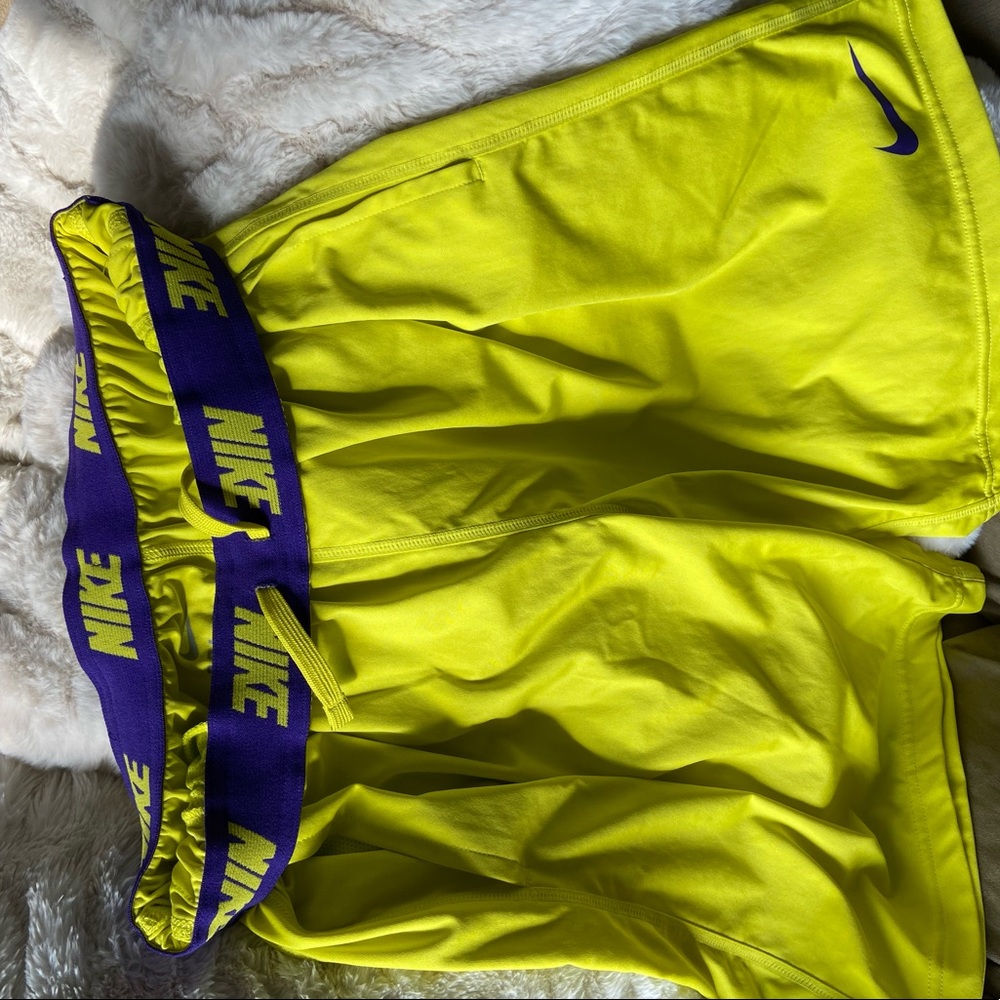 Highlight yellow Nike basketball shorts